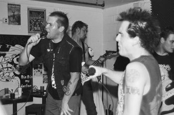 Live @ the Sleeping Turtle, September 18th, 1996. #4 On the right is Oral B. AKA Martail Flaw (Andre Bricio), who filled in as the second vocalist on tour after Rikkir's departure from the band a few weeks prior. Photo by and courtesy of Chris Boarts Larson © 1996. http://www.slugandlettuce.net
