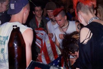 Civil Disobedience show @ The T.A.C., June 14th, 1992. J. Edgar Hoover rolls over in his grave... Flag desecration was about more than just protesting proposed constitutional amendments limiting freedom of speech, it was about protesting the many crimes against humanity committed both at home and abroad by the forces of U.S. imperialism.
