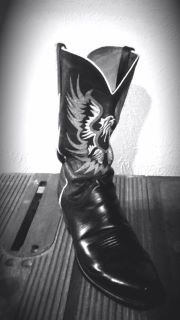 New Boots, Austin 2012. Well, used boots. New to me. Photo by Alison MacArthur. At feminist stripper's pad.
