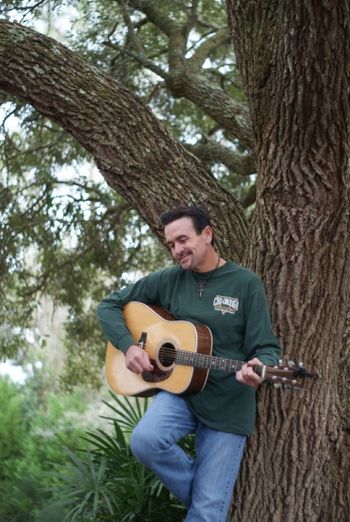 Playing Under the Oak Tree Trafton Harvey | Singer - Storyteller - Survivor
