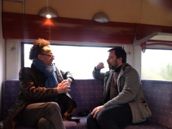 Mourad and Nico on the train back to Paris, returning from Saintes, France.
