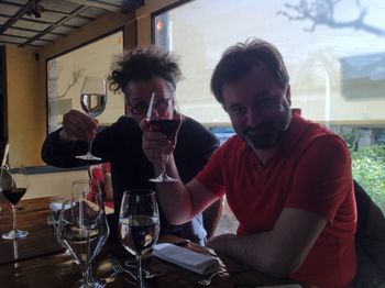 Mourad and Nico, getting fortified before the concert, Saintes, France.
