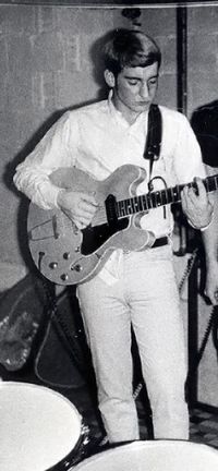 young Randy with guitar