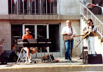 Ancient History #8 - An experimental trio with Lafayette, IN farmer and musician Kenn (2 Ns) Clark and his guitarist pal "Slick" whose real name I never knew. It was about 105 F. that day. I think that was my first "good" Hawaiian shirt. Luv them shades!
