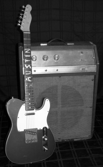 1980s Fender Telecaster (Austin in mother of pearl), Montgomery Ward amp.
