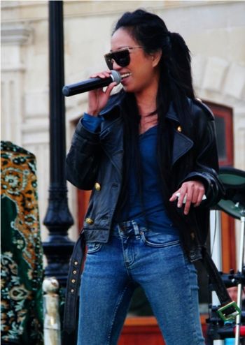 Michelle Hope at outdoor concert in leathers and denim
