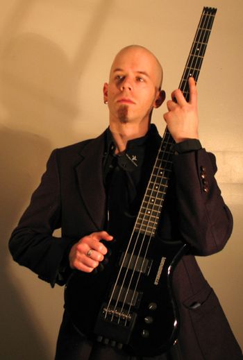 David with Steinberger XQ-2A again Not sure what look I was going for there...sort of Tony Levin meets Neo.
