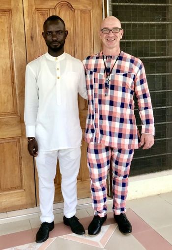 Robert Brookman and David in formal wear Yes. They look like Pajamas!  haha But they are actually African Formal attire custom made for David
