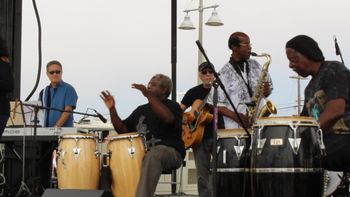 Wave Festival in Venice Beach California Steve Correll - Keyboard, Stefan Taylor - Conga Drums, Joe Gaeta - Guitar, Jack Fulks - Sax, Steven McGill appears to be playing his Conga Drums , but is actually playing Bongo
