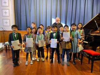 Jaiden Lam winning gold medal at Piano Plus Festival 2021 ( back row 2nd left)