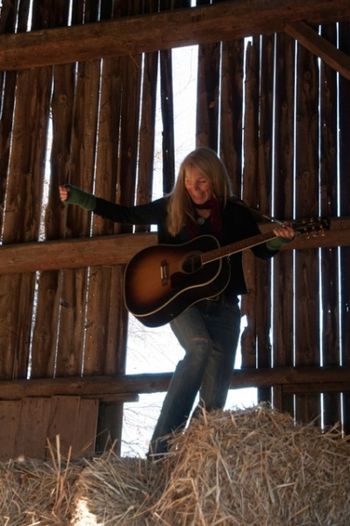 Hanging out in the hay w my Guitar... hmmm
