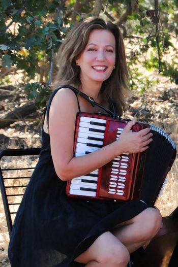With my accordion from the photo shoot for "Faith, Good Neighbors and a Telephone"
