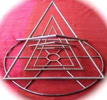 The 3D Sri YANTRA (with 6 triangles) stands on its own as a 3D sculpture on a round base Bronze Designs for Enlightenment © Carmela Tal Baron Soon to be 3D printed by ShapeWays (custom made to order )
