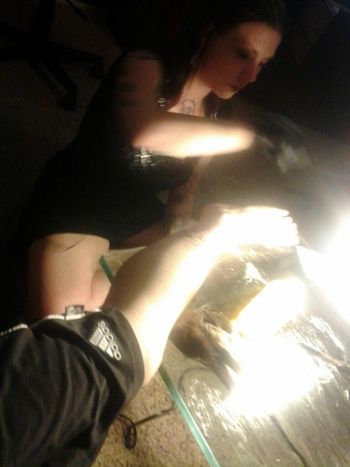 Christie setting up for a lil o' PIGgy tattoo!
