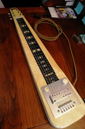 1949 SUPRO LAP STEEL with classic cream 'MOTS' finish and fabric cord. (And, yes - that really does stand for 'Mother of Toilet Seat')
