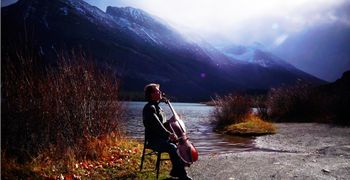 Cellist, Daniel Gaisford in Many Glacier, Montana.
