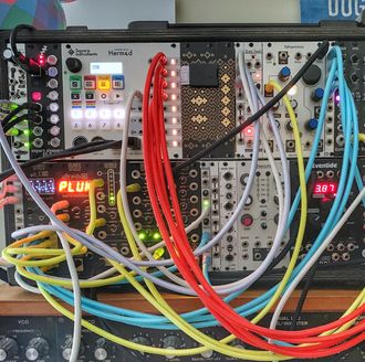 Image of: close-up of modular synth with many patchcords