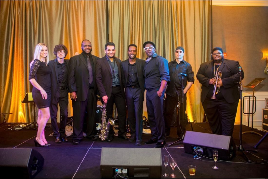 From Left to Right: Tara (vocalist), Jacob (lead guitar), Derrick (keyboard), Jerry (saxophone), Lisco (drums), D-Soul (vocalist), Nick (bass guitar), Alonzo (trumpet)
