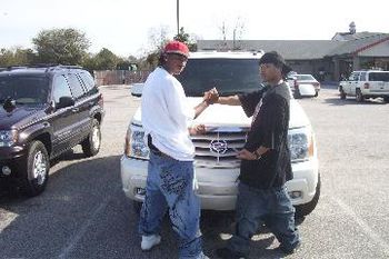 Eyez and T-Byrd pose in front of the C.E.O. and Road Managers Brand New Jeeps during the Spring Break Tour...

