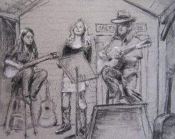 A live moment on stage at Crossroads, the Winnsboro, TX venue we founded in 2005 - captured by pastel artist Barb Richert.
