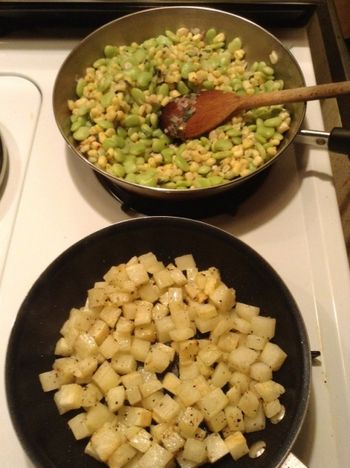 Succotash and Cubed Potatoes on the Stove
