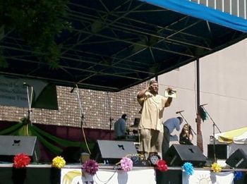 GRANDE GATO at 2008 HISPANIC FESTIVAL onstage holding up third book published WS,NC(2nd pic)

