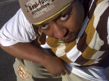 2010 pic of J.O.T. aka GRANDE GATO wearing casual pants with SOULFULL logo.
