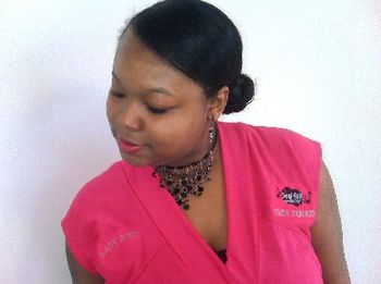 MS. CRYSTAL wearing pink LADY SOUL blouse with V neckline
