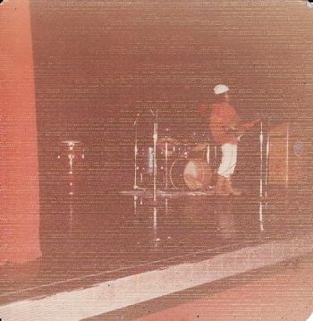 My first gig, age ten. Some things never change; I still love to wear cowboy boots and weird things on my head onstage!
