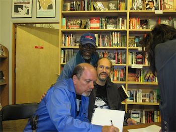 Steven Roby & Brad Schereiber autographing  Copies of thier new book  "Becoming Jimi Hendrix"
