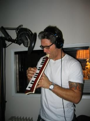 Jon playing melodica
