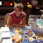 Christiana selling her baked goods at the Eno River Farmers Market 2008
