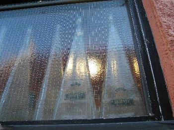On Thursday August 3 we played at the Platform Tavern in Southampton.  Those are empty absinthe bottles on display in their window.
