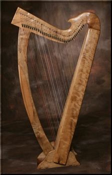 This is Aoife - the harp that recorded Silverwheel.  36 strings on hand-carved myrtle wood.  The frame supports a string tension of over 1,400 pounds.
