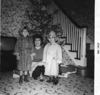 Who'll stop the rain? Doesn't matter, we're ready.  Rug pattern and wallpaper was my first acid trip. Joyce, Mom, me in Philly, Pa.
