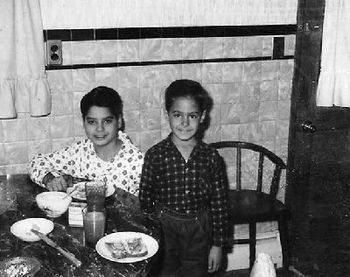 Breakfast in America..Menlo Park Terrace, NJ.  Cinnamon toast, Tang, and an ashtray full of crushed out Pall Malls, courtesy of Mom. ("Go comb your hair boys, we're trying out this new Polaroid dealie
