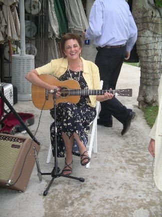 Playing guitar at Leslie and Terry's wedding.
