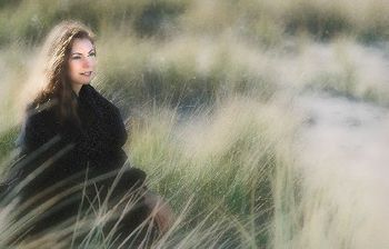 This image is from a photo session I did on Bethany during a show tour along the Oregon coast. It was taken in a high grass area on a rocky coastal beach just North of Seaside, OR. (Photo Image by Jim

