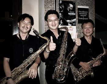 The Mighty Mighty Saxophone Brothers (Tung, Thi, Duc)
