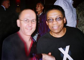Curtis King presenting HERBIE HANCOCK with the "Blues in... Asia" CD!
