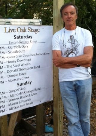 Banjo Bob with the band schedule
