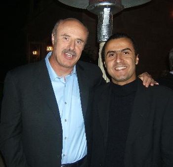 Dr. Phil and Marco Tulio, after playing for an event he was present.
