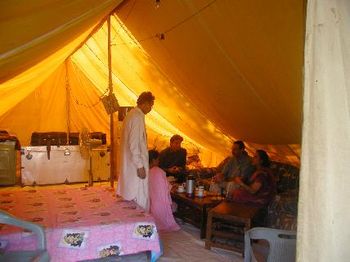 "Guest space" in tent village (r-left: Batool, Larry, Noaman, Principle Zaira & her dad
