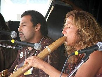 Annie performing with Pakistani rock star/UN ambassador Salman Ahmad at~ Philly Folk Fest (photo by Kevin & Danielle Swart)
