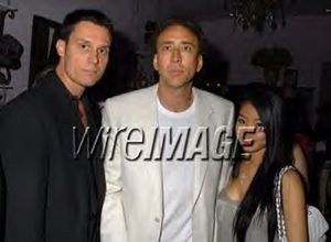 Keith Collins, Nicholas Cage & Wife Alice Kim at the Haven Hills, Hats Of For Cancer & Single Mom's charity event in Los Angeles, CA (photo credit- Barry King WireImage.com)
