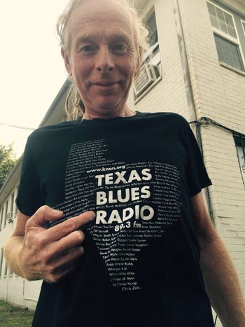 Dave is pointing to our band name on the KNON t-shirt. What a list! So proud to be among these great bands!
