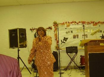 Friend of Evangelist Louise Moore rendering a solo at Bell Singers Banquet
