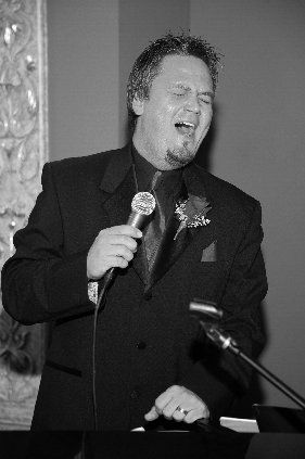 Sean singing the Bob Carlisle classic "Butterfly Kisses" @ Joel & Dayna Tolley's wedding reception......
