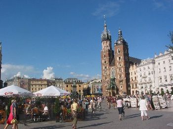 Krakow, Poland -- July 2008 -- This central market square has seen wonderful and terrible historical events over the centuries.  We came to lift up Jesus Christ so that people might turn to Him as the
