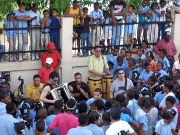 Here we are playing in the Dominican Republic in 2006. Machete is on the accordion, Jaime is on the bass guitar, Derek on the congas and Alvin is sitting down playing percussion.
